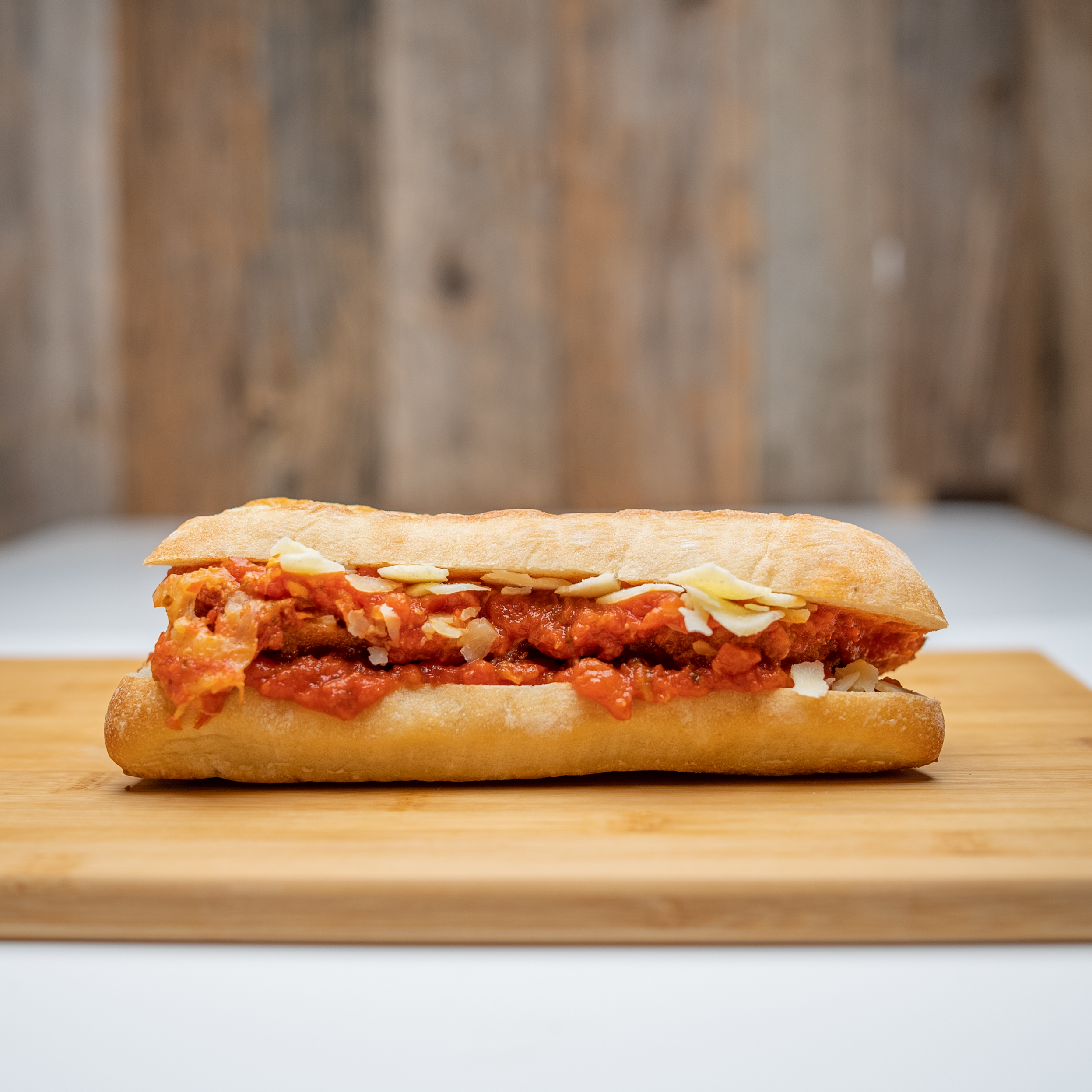 Chicken Parma - Halal crispy chicken patty, hand-breaded fresh dai...